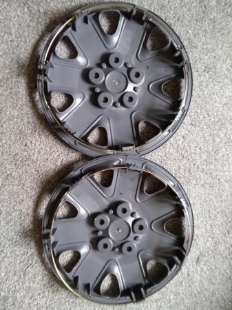 Image 1 of 2 Plastic  Wheel Trims unused