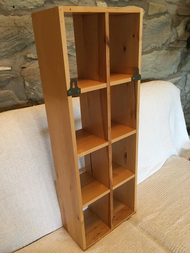 Preview of the first image of Wooden Cube multimedia storage unit.