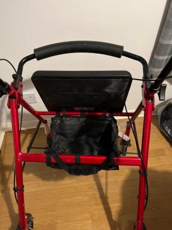 Image 1 of Four Wheel Walker Colour Red With Seat
