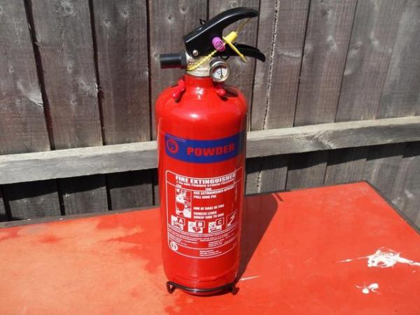 Image 1 of Fire extinguishers and signs only 2k powder left