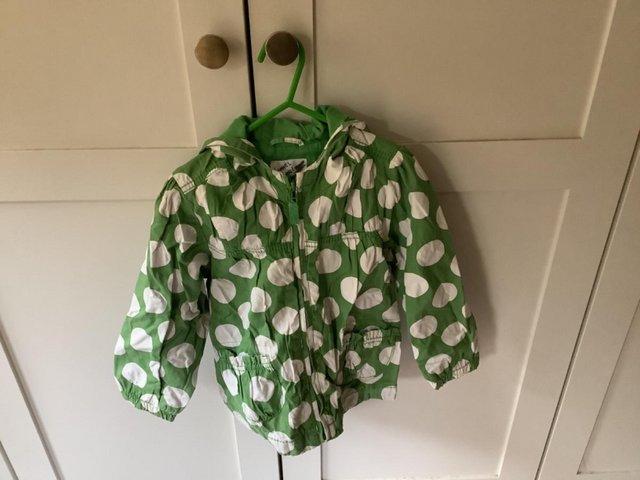 Preview of the first image of Jacket Style Raincoat child’s. Girls polkadot.