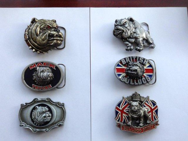 Preview of the first image of PEWTER & ENAMEL BULLDOG BELT BUCKLES.