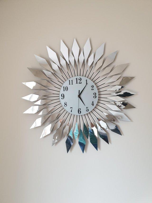 Preview of the first image of Electric wall clock for sale. Unusual design.