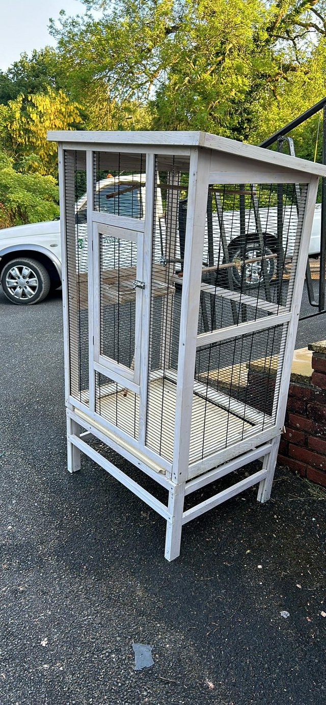 Preview of the first image of Large wooden bird cage indoor aviary.
