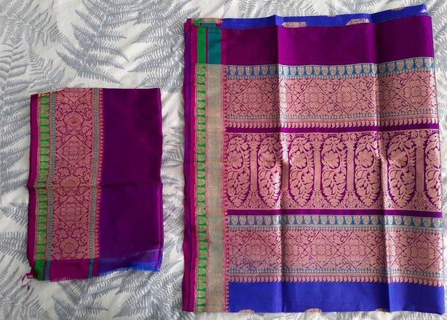 Preview of the first image of Royal blue and pink with gold embrodiery banarasi silk saree.