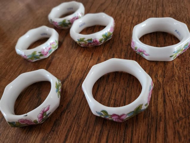 Preview of the first image of FLORAL BONE CHINA NAPKIN RINGS ~ SET OF 6.