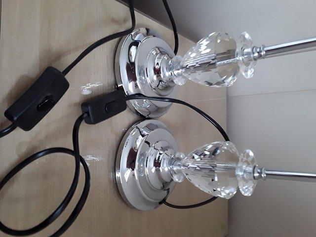 Preview of the first image of TWO POLISHED CROME TABLE LAMPS.