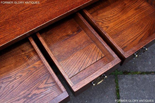 Image 80 of TAYLOR & Co STRESSED OAK THREE DRAWER POTBOARD COFFEE TABLE