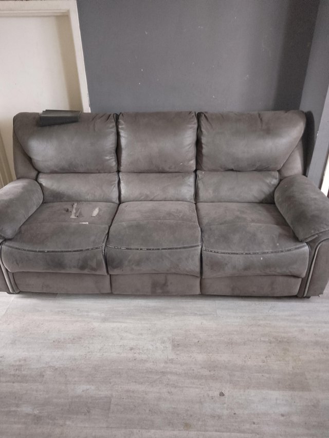 Preview of the first image of Grey sofa big fabric great condition.