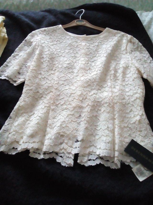 Preview of the first image of BEAUTIFUL LADIES CREAM LACE TOP.