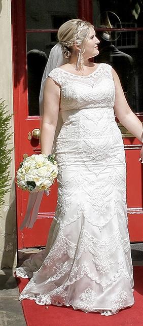 Preview of the first image of Wedding Dress & Veil size 12-14.