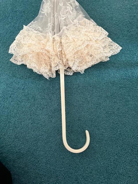Preview of the first image of Wedding parasol.  Cream/Ivory.