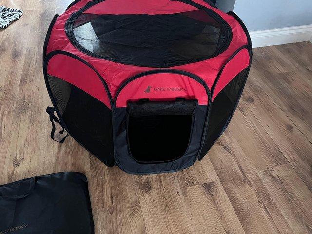 Preview of the first image of Folding pet crate with It's case.