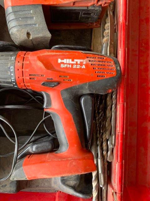 Preview of the first image of Hilti combo drill set complete with charger and case.