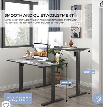 Image 1 of Adjustable standing desk for home office purchased in 2023