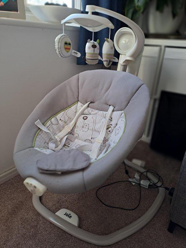 Preview of the first image of Joie Serina Swivel baby swing.