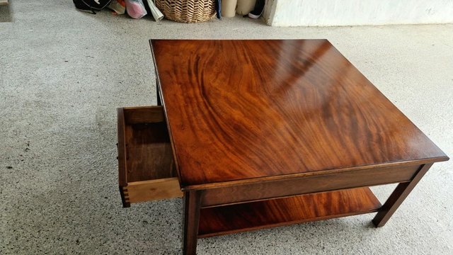 Preview of the first image of Solid mahogany coffee table with 4 drawers.