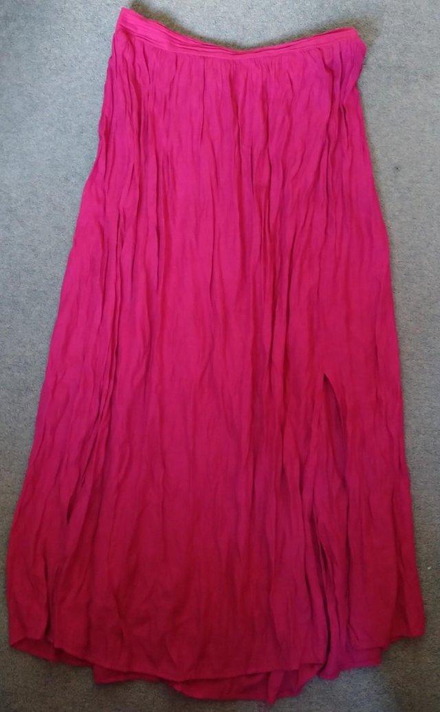 Preview of the first image of Next pleated long pink skirt- size 14 (UK).