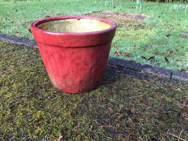 Preview of the first image of Glazed red ceramic garden planter.