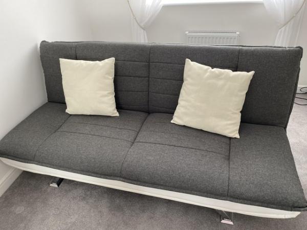 Image 1 of Charcoal grey material sofabed with chrome legs