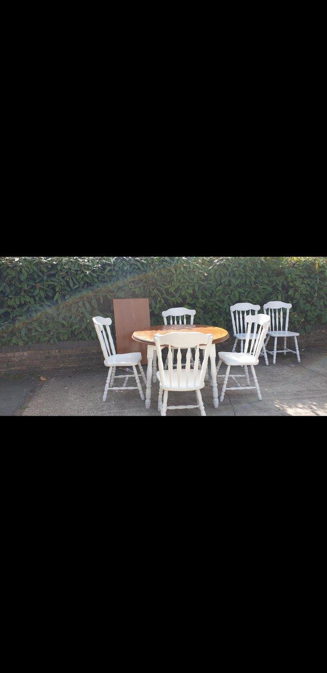 Preview of the first image of Farmhouse Style Dining Table And Chairs.
