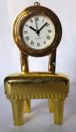 Image 1 of MINIATURE NOVELTY CLOCK - A PADDED CHAIR