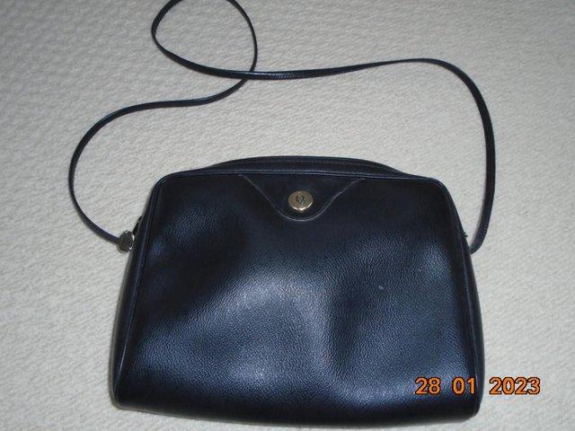 Preview of the first image of Christian Dior vintage black handbag.