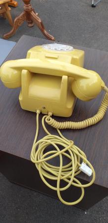 Image 1 of Retro telephone in mustard