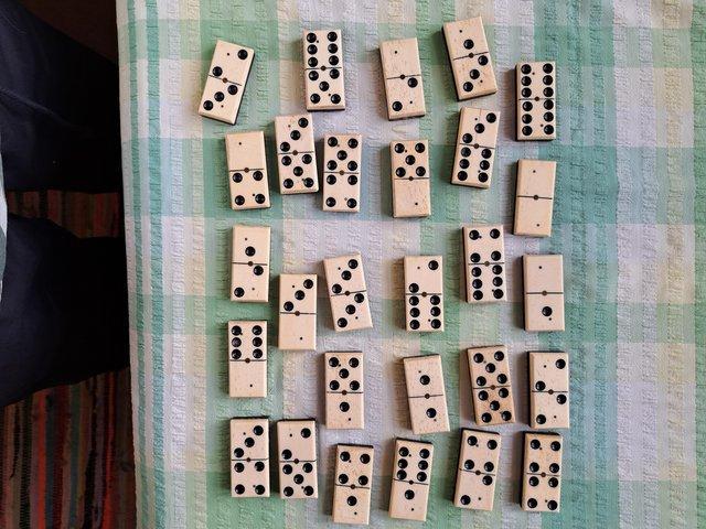 Preview of the first image of Victorian set of Dominoes. Made of ebony and bone..
