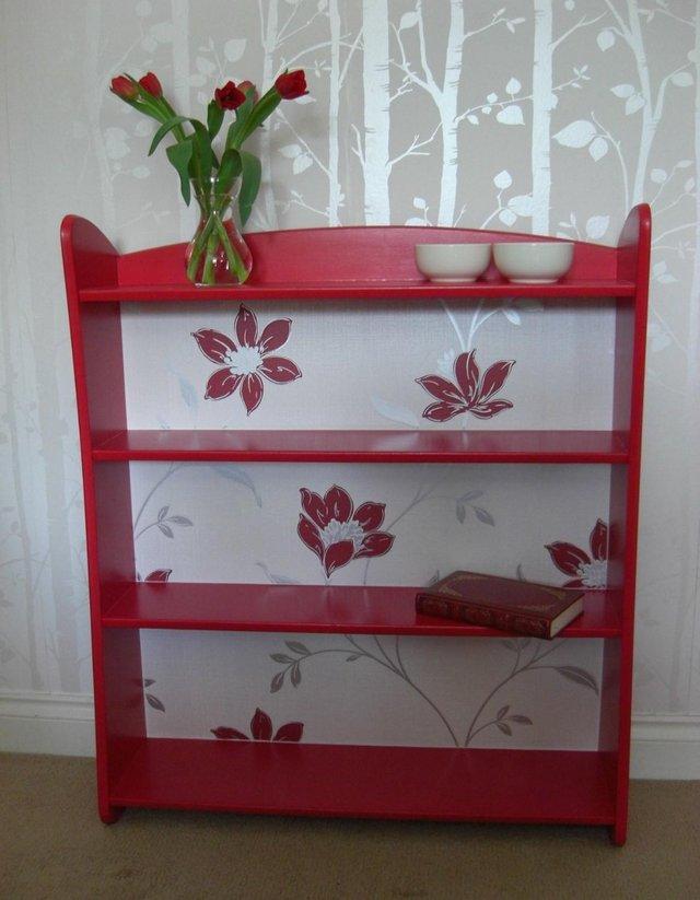 Preview of the first image of 1960s bookcase in red, with decoupage.