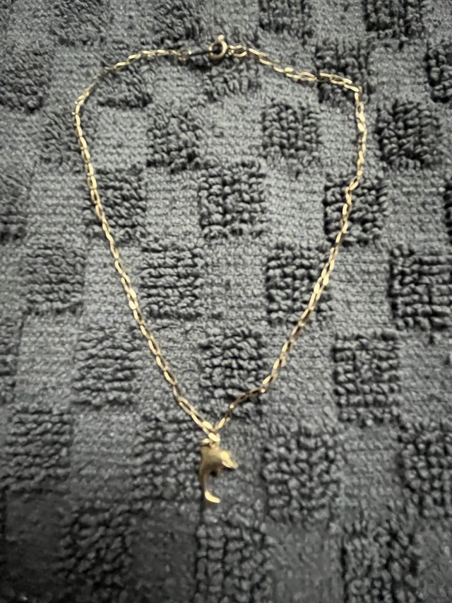 Preview of the first image of 9CT Gold Anklet With Dolphin Charm.