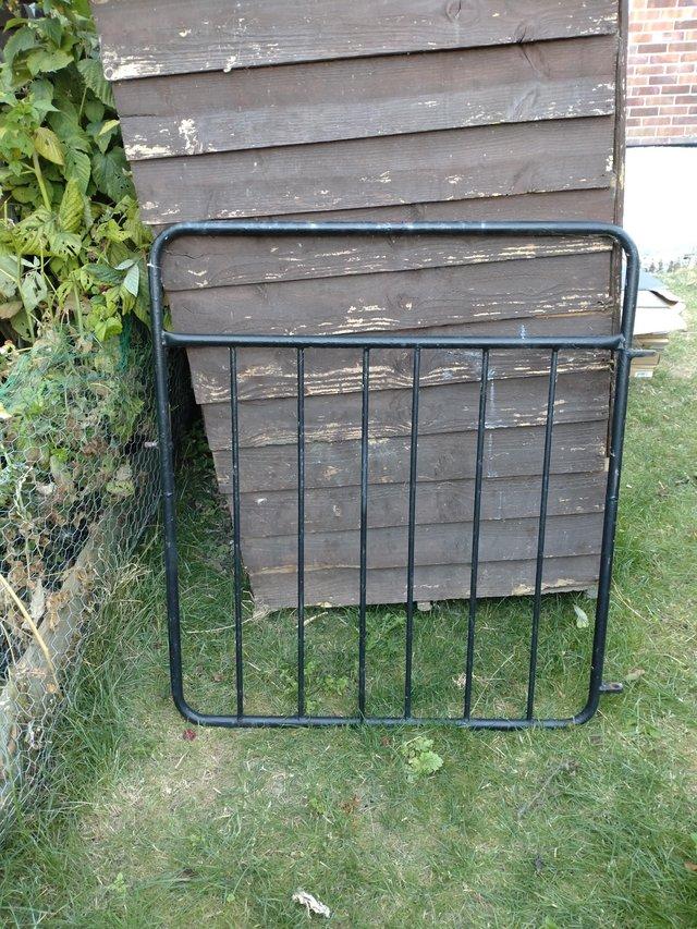 Preview of the first image of For sale metal garden gate black.