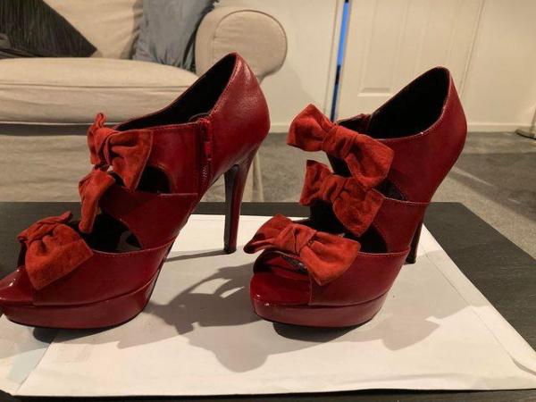 Image 1 of Size 4 red/burgundy colour shoe
