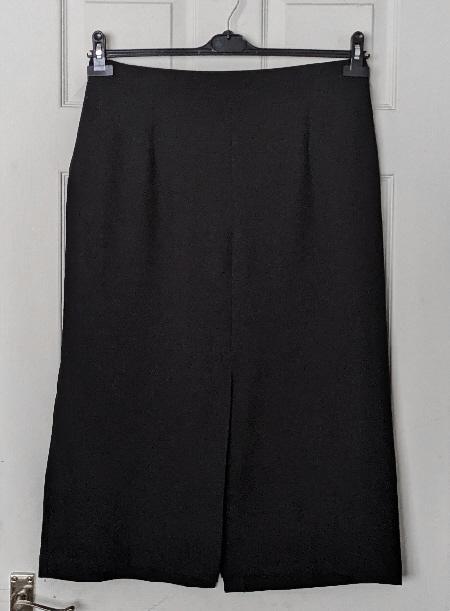 Preview of the first image of Smart Ladies Black Skirt - Size 18.