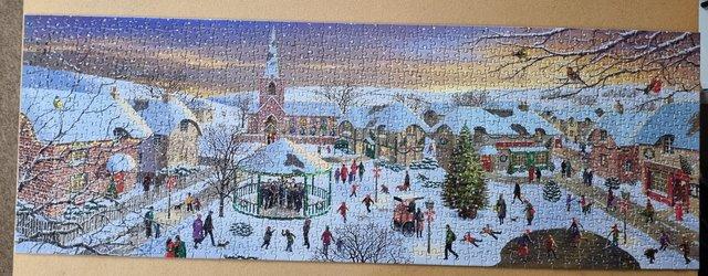 Preview of the first image of 1000 piece jigsaw called A FESTIVE CHRISTMAS VILLAGE BY W H.