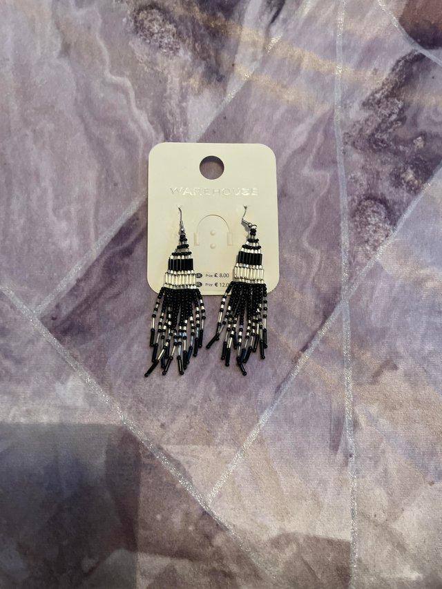 Preview of the first image of Warehouse Earrings …unusual black & white.