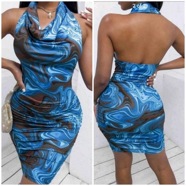 Preview of the first image of Size 12/14 blue halter dress.