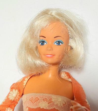 Image 2 of 1990,s DOLL by LUCKY in ORANGE DRESS 30 cm tall