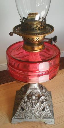 Image 3 of Vintage oil lamp with 'cranberry' coloured glass reservoir