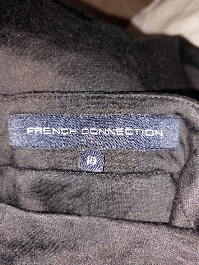 Preview of the first image of French Connection Strapless mini Black dress size 10.
