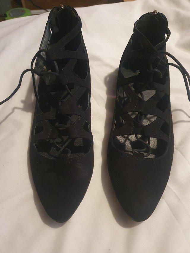Preview of the first image of Lovely lace up black suede shoe.