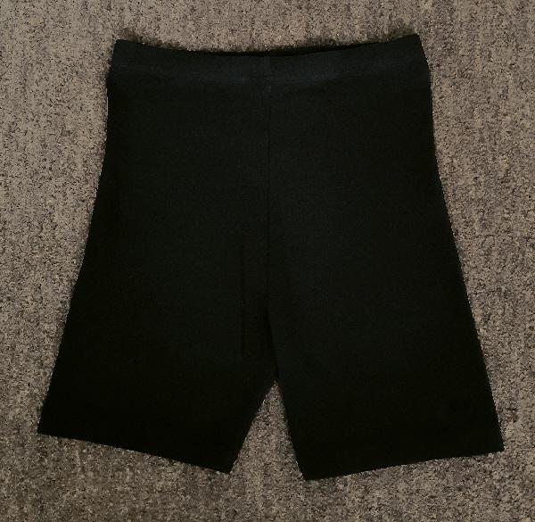 Preview of the first image of Girls Black Lycra Shorts By Next - Age 14 Years   BX16.