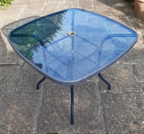 Image 3 of Glass Patio Table and 2 Folding Chairs