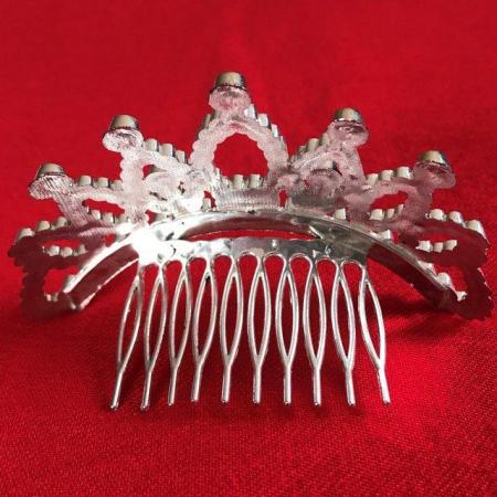 Image 3 of Mini tiara hair comb in silver coloured plastic.