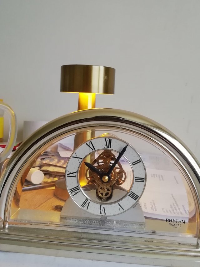 Preview of the first image of Battery operated gold Clock.