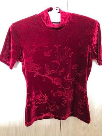Image 1 of Designer tops.  Two in red and one in black.