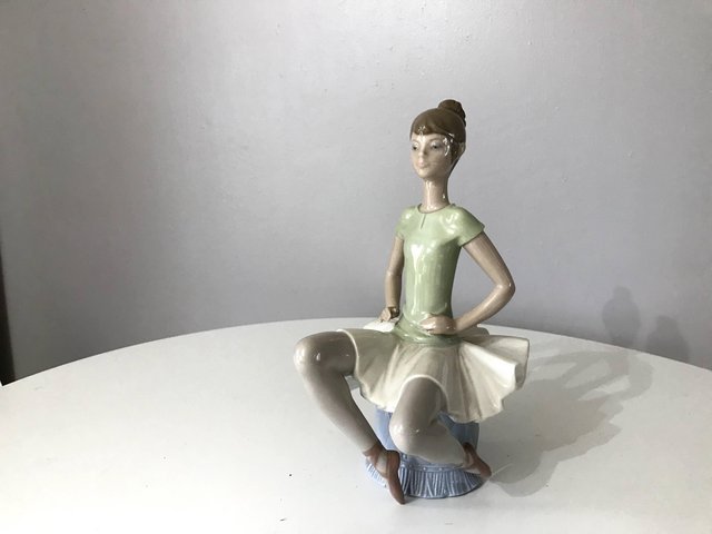 Preview of the first image of Lladro NAO Sitting Dancer Rare Retired.