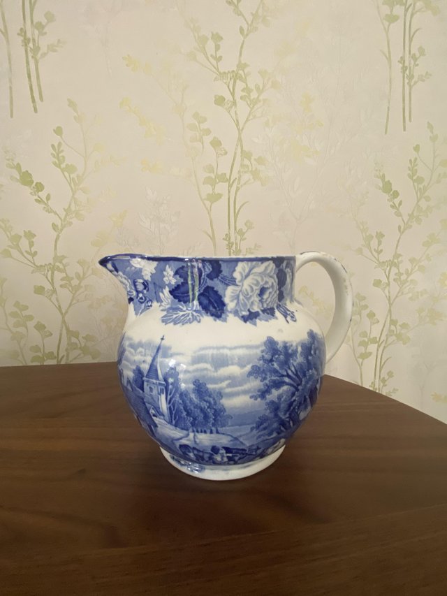 Preview of the first image of Elegant blue and white ornamental jug.