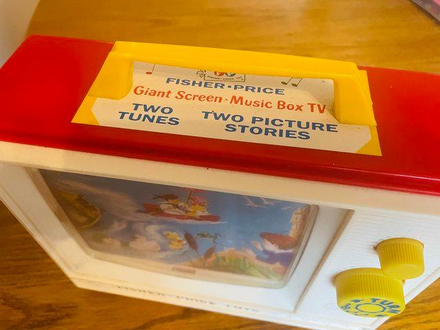 Preview of the first image of Vintage fisher price wind up tv/ music.
