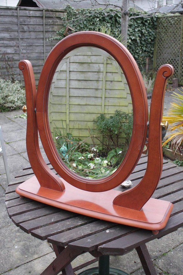 Preview of the first image of FREE Oval Bevelled Mirror On a Swivel Stand.